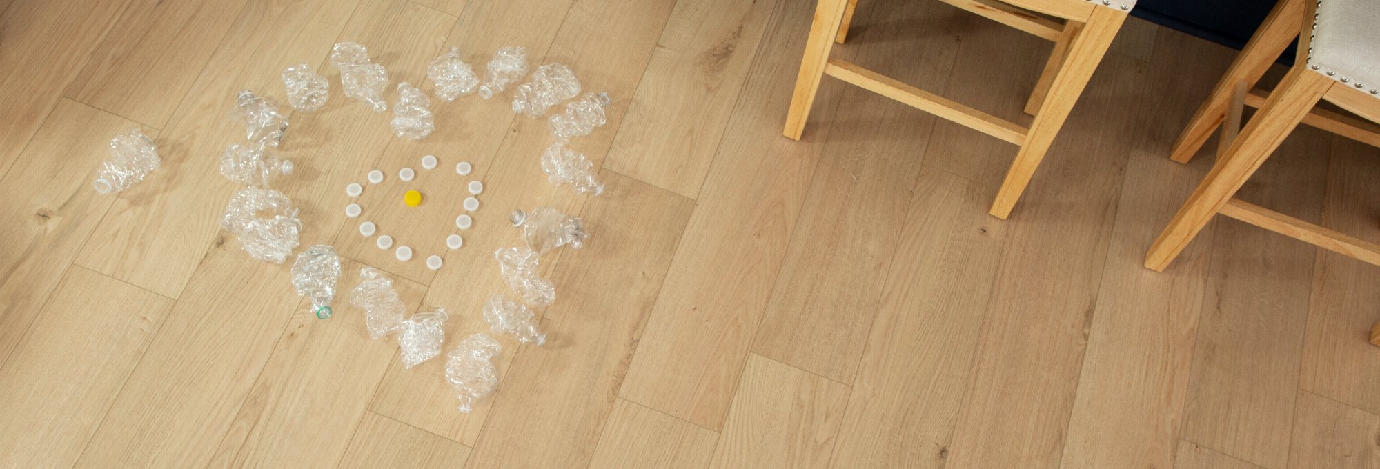 Heart design made of plastic bottles on a sustainable SolidTech R floor